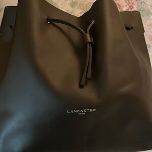 Lancaster brand made in Paris with pouch bucket bag